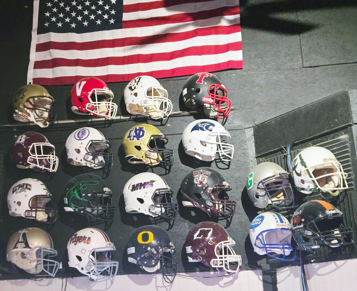 Chawgo's tweet photo. 71 High School and College Football Helmets now on the wall at Gridiron Grill in Breese.  If you don't see your school, get one up here! https://t.co/IGmLx16MJT