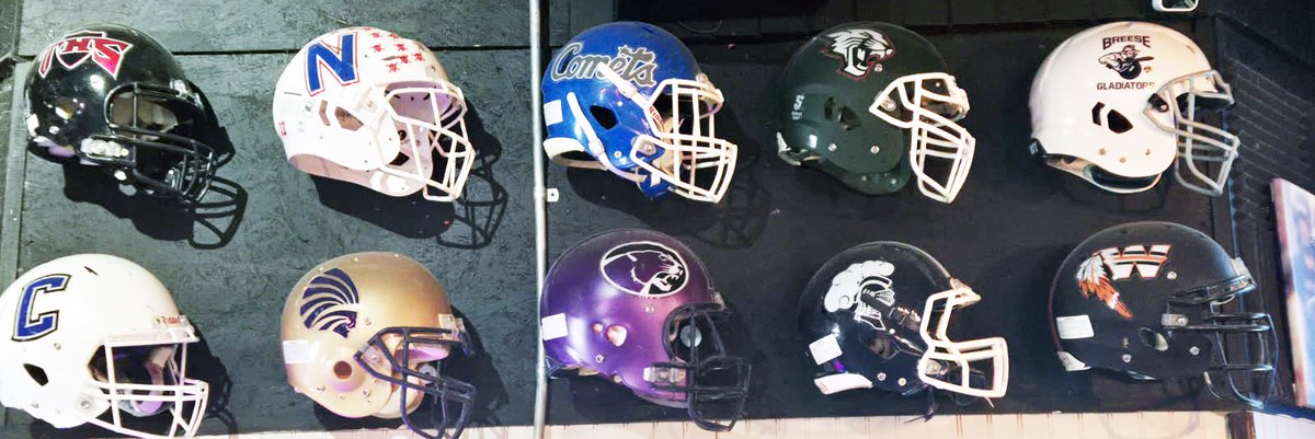 71 High School and College Football Helmets now on the wall at Gridiron Grill in Breese.  If you don't see your school, get one up here!