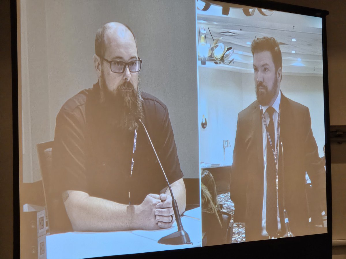 SaskTLA's tweet photo. Brian Pfefferle, K.C. of Pfefferle Law, questions "Sgt. Fred Webb" played by local actor Jay Malo. Happening now at the STLA Fall Conference Mock Trial https://t.co/DAep2GD8m4