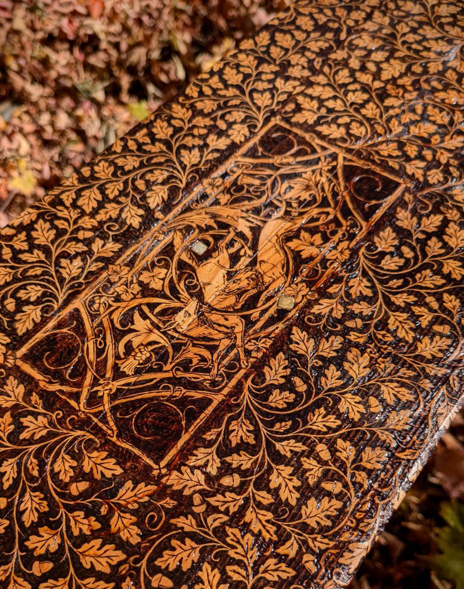 capstellium's tweet image. anyway, i woodburned this antique ironing board