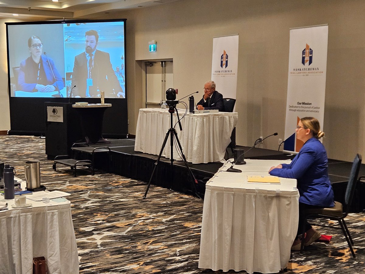 SaskTLA's tweet photo. Brian Pfefferle, K.C. of Pfefferle Law, cross-examined "Roberta Wilson - Life Insurance General Manager" played by local actor Chelsea Wegman. Happening at the STLA Fall Conference Mock Trial. https://t.co/zfLVvweFq2