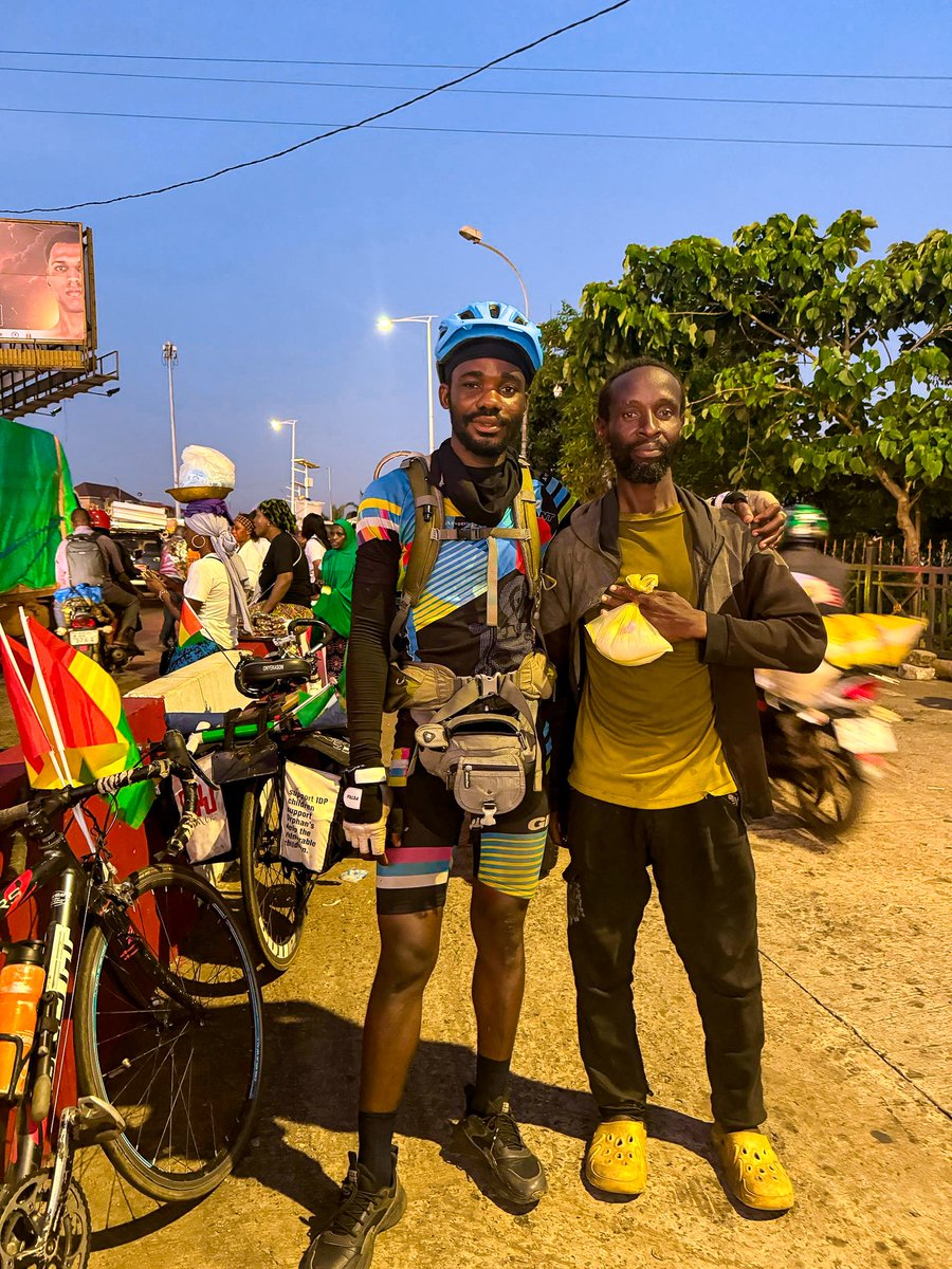 emmiwuks's tweet photo. DAY96 NIG2USA ON A BICYCLE 🇳🇬🚴🇺🇲
FAMILY, PLEASE READ THIS 🙏.
Tonight, I met a My Nigerian brother here in Guinea. His name is Olugbenga Oshimowo, 45 years old, from Lagos State.

He left Nigeria in 2021 with the dream of finding a better life, but unfortunately got stranded in Mali. He was arrested, detained, and in the process, he lost everything. Now he is stuck in Guinea with no means to return home.

Gbenga sleeps around the Airport Roundabout here in Conakry, because he has nowhere else to go. 

According to him, he has family in the USA, a sister named Arinola Gudonu and a cousin Moronike Ayodele,  but he has lost contact and has no way to reach them.

When I asked him if he would like to return to Nigeria, his answer was “Yes.

The best way I can help is to share his story with the world, believing that through the power of humanity, compassion, and connection, someone out there can step in to help this brother find his way back home.

If you know him, his family, or any way we can support his return, please reach out. Let’s not allow one of our own to be lost in a foreign land. ✊🏾❤️🇳🇬

Together, we can bring Gbenga back home.
GOD BLESS AFRICA.

#NIG2USA #nigeria #africa #fypシ゚ 

@renoomokri @ruffydfire @PoojaMedia