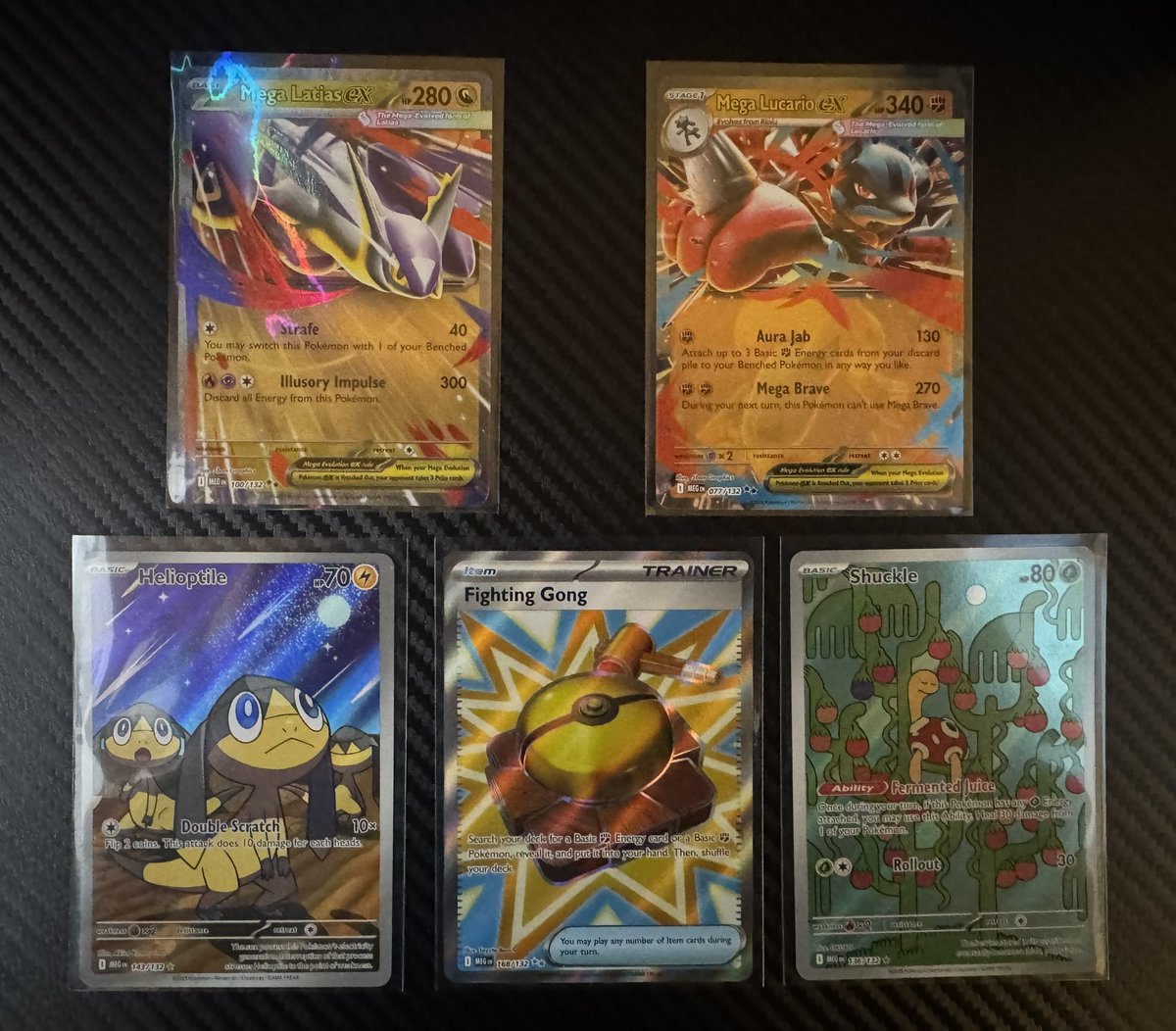 My “hits” from 2  booster bundles of Mega Evolutions. I would be extremely disappointed if I bought at market price 😅