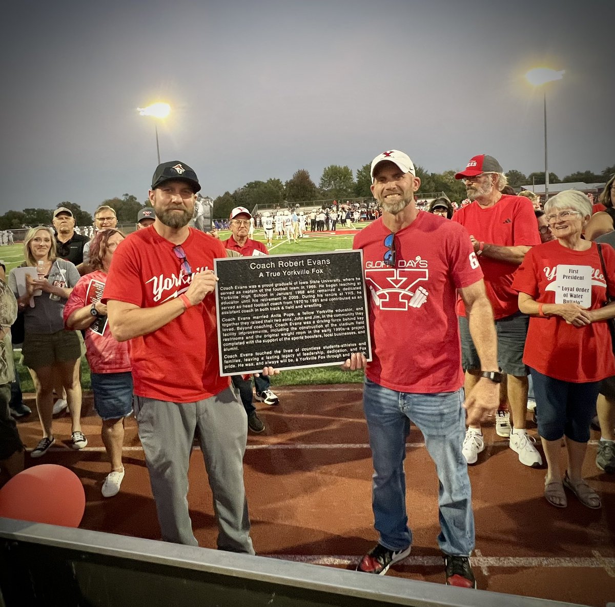 Yorkville115's tweet photo. Tonight, the Foxes recognized long time legend, teacher, and coach, Bob Evans!  Coach Evans was unable to attend the ceremony but his wife and sons were on hand to accept the recognition. Congratulations! #WeAreYorkville https://t.co/qALb8RjPmd