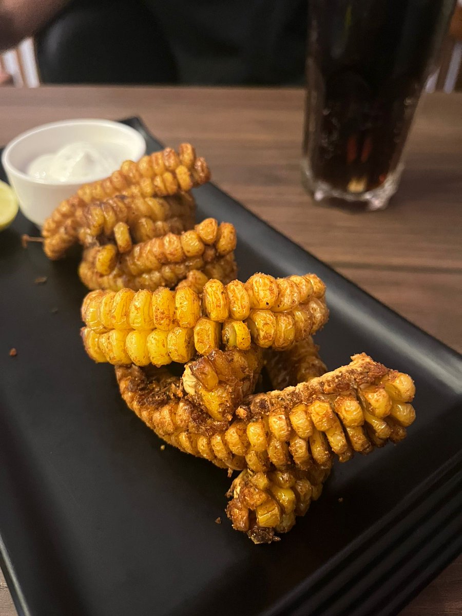 kaustavk's tweet photo. Finally got to visit Smash Guys Burgers in Indiranagar. The highlight of the night were the corn ribs. Don't forget to order a side of seasoned bone marrow! Tell the staff your taste preferences and they will suggest the right burgers 🍔 https://t.co/6hrZGE6Htd