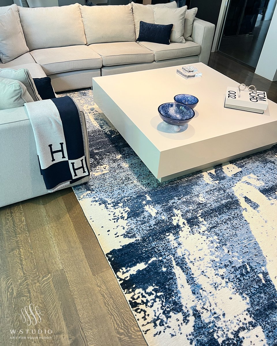 We transformed this family room by replacing our client’s old carpet with this stunning new design. It took 4 of our brave associates to move the 500lb table — but the result? Totally worth it. #WStudio #ArtForYourFloor #interdesign