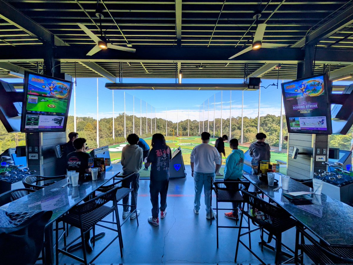 Camaraderie before competition. <a href="/Topgolf/">Topgolf</a>
