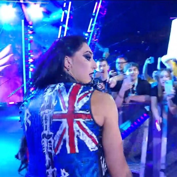 edxth42's tweet image. It’s updated 😆 @RheaRipley_WWE wore her Australia flag 🇦🇺 vest #WWECrownJewel  #RheaRipley