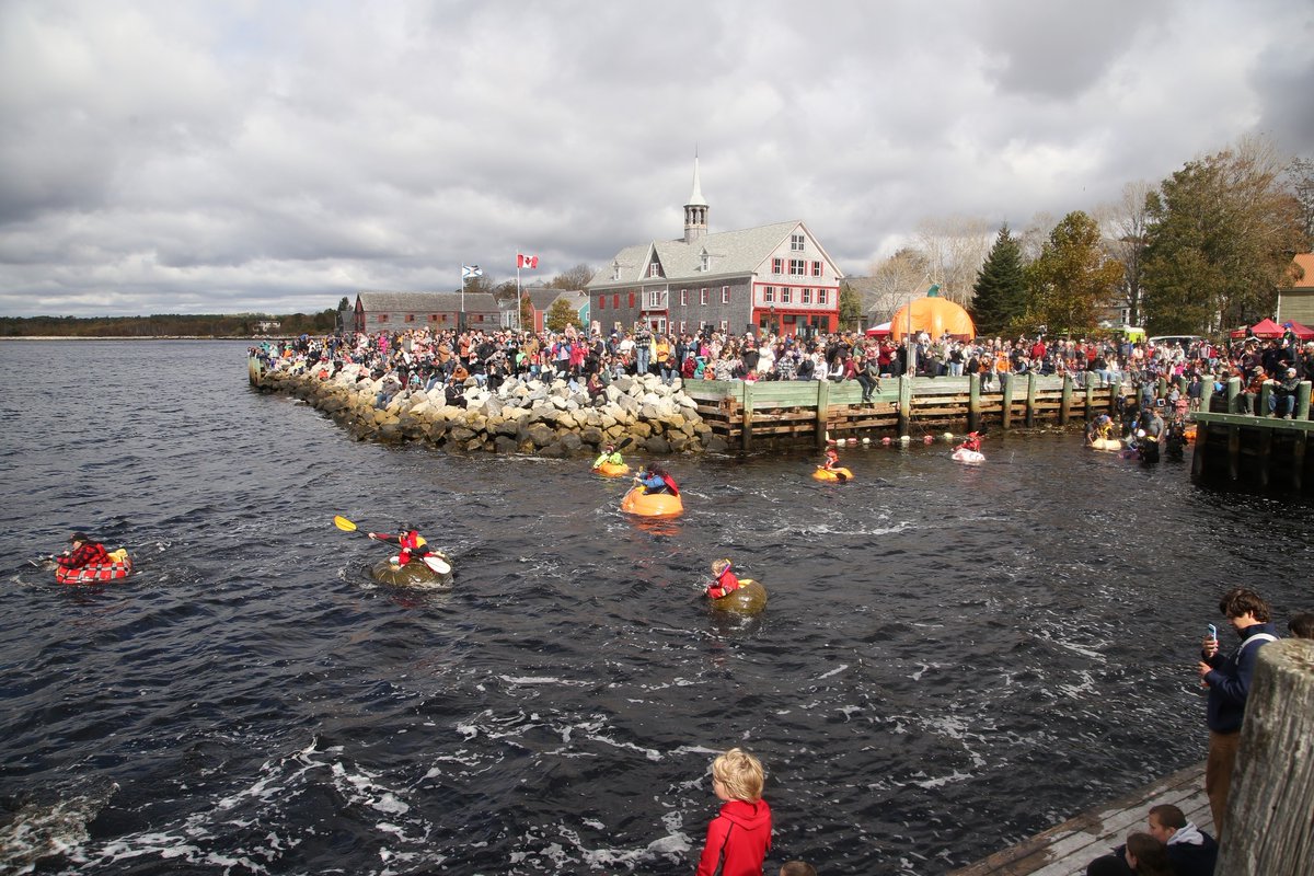Canada's tweet image. On your marks, get set, PUMPKIN! Today is the 4th Annual #NovaScotia Giant Pumpkin Festival & Regatta. The event features many activities, with the highlight being contestants paddling in giant pumpkins along the shore. Have you ever dreamt of racing a giant pumpkin? 🎃