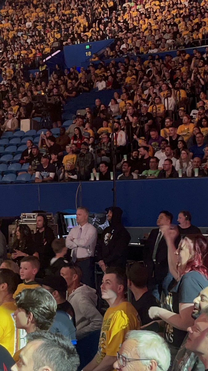 WrestlePurists's tweet image. CM Punk watched John Cena vs. AJ Styles from the crowd!

#WWECrownJewel 

(📸: @bennytaysPls)