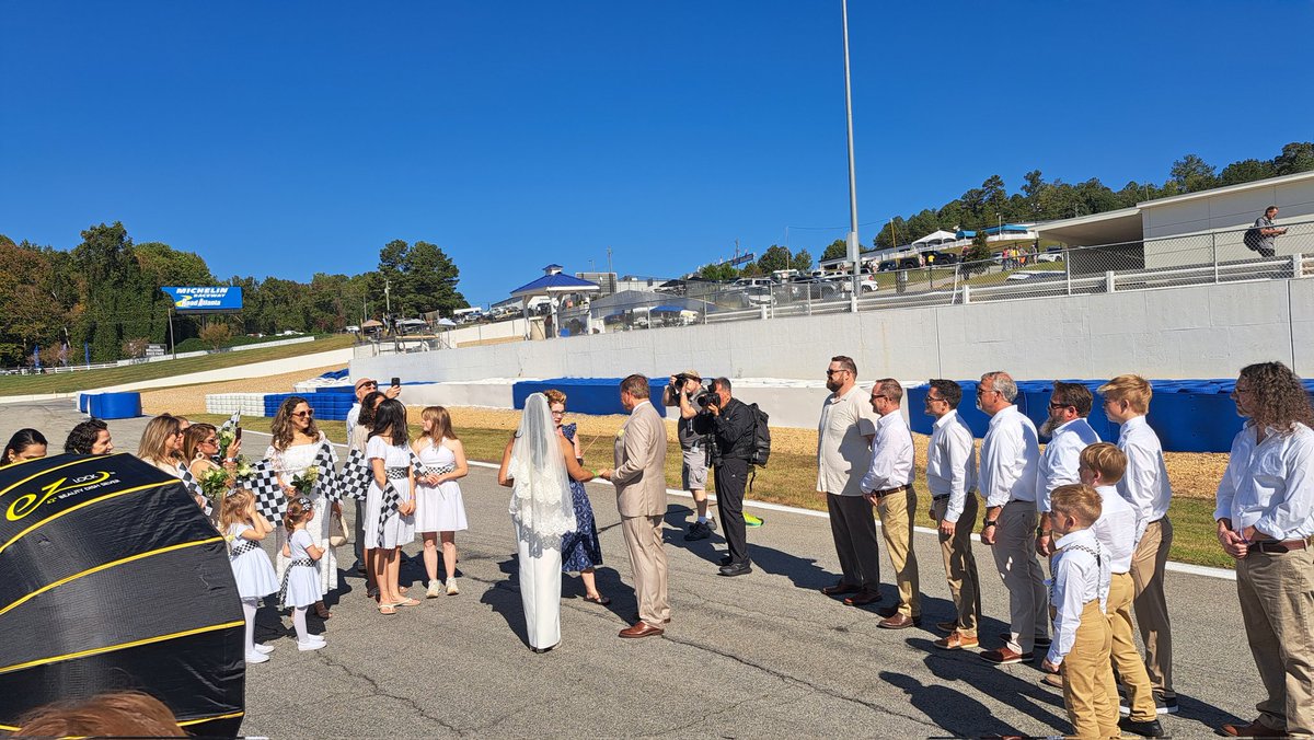 Someone is literally getting married on the grid. IMSA rizz has reach an all-time high race fans!