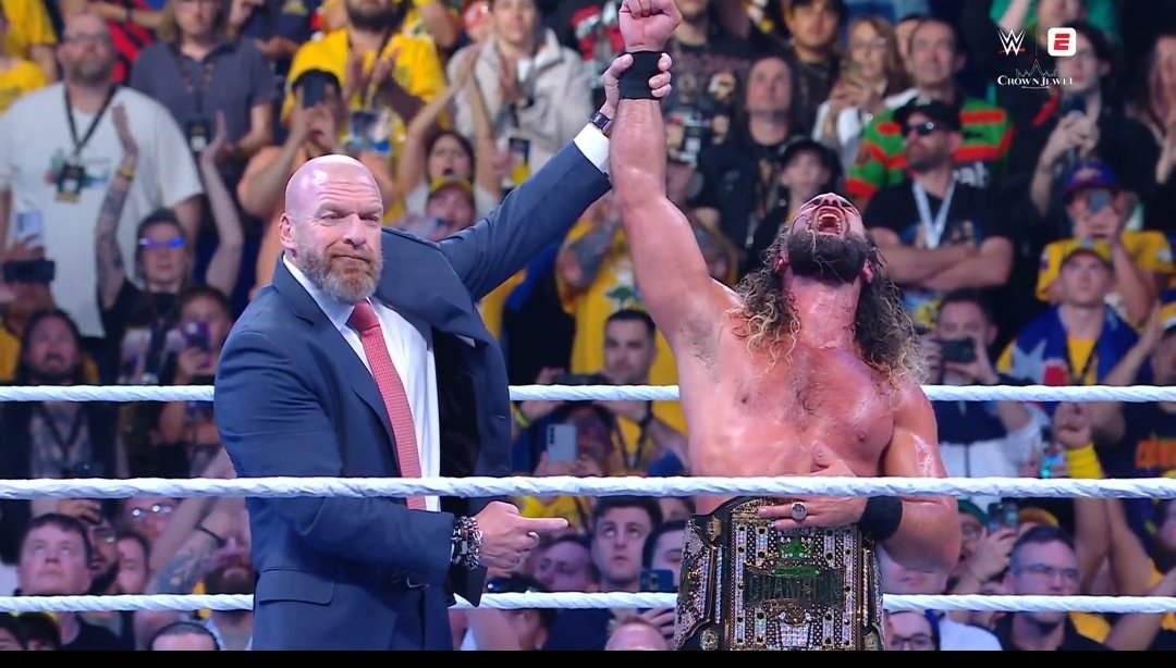 ibeastIess's tweet image. A father raising his son&apos;s hand in victory.