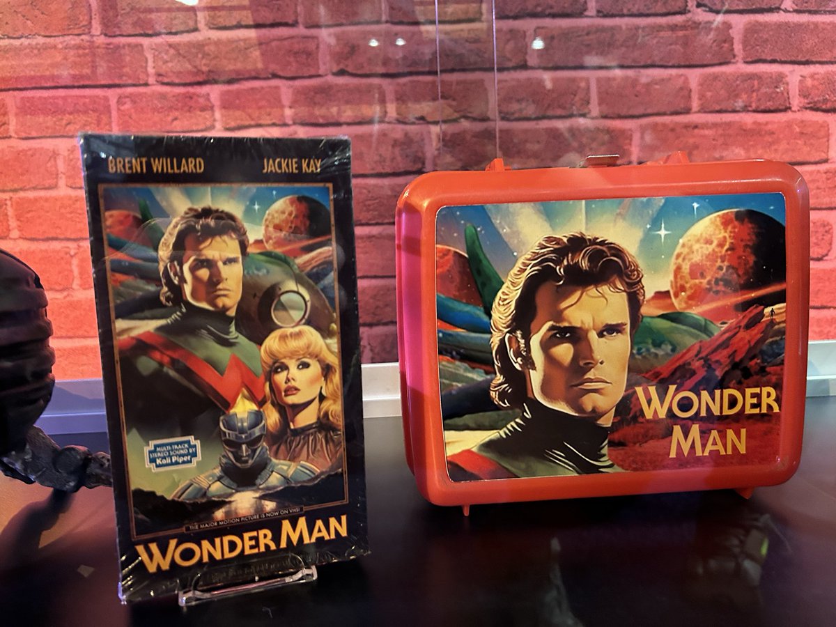 searcher_gold's tweet image. I asked the folks at @Marvel’s booth if the #WonderMan poster art for the in-universe movie being rebooted is AI-made/generated.

They said “it’s artwork made by artists but touched up by AI,” which I asked “so, really AI-assisted photoshop work” for clarity, and they said “yes.”