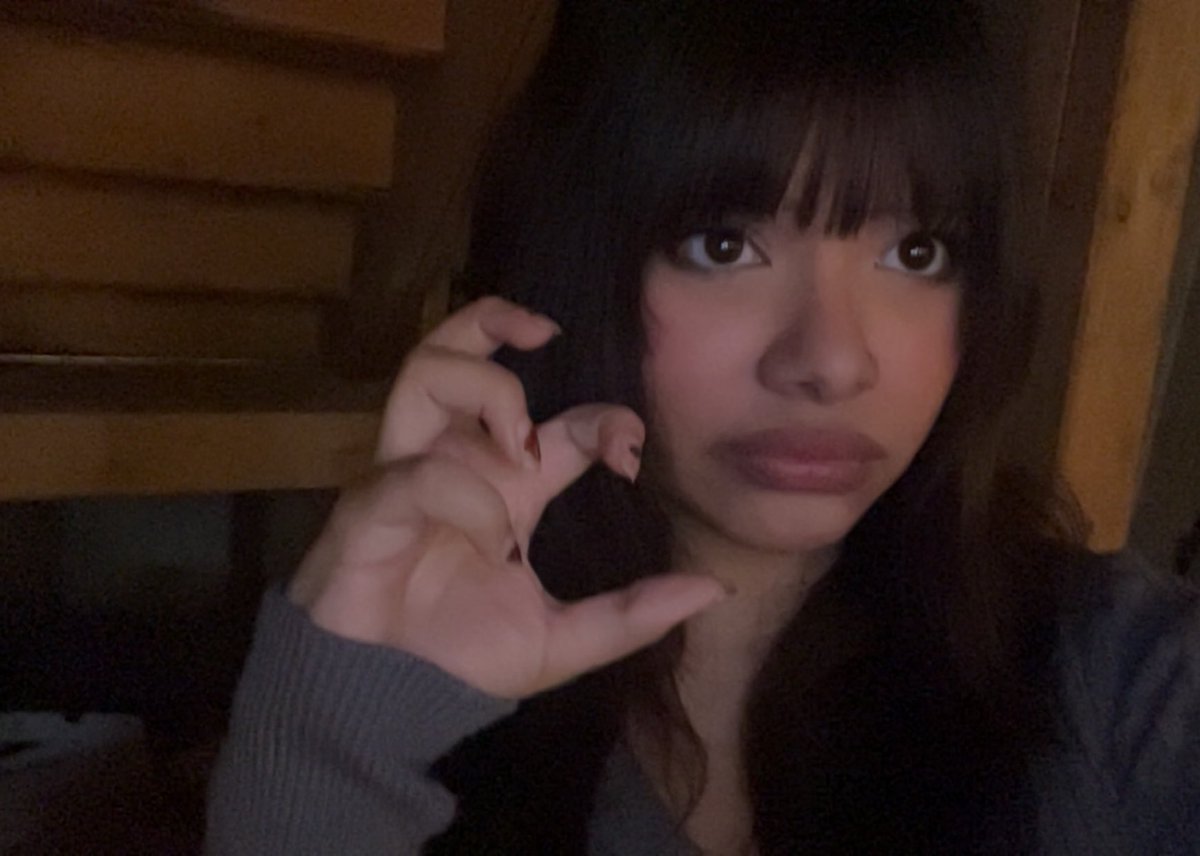 girl who can’t take a selfie without making a weird face