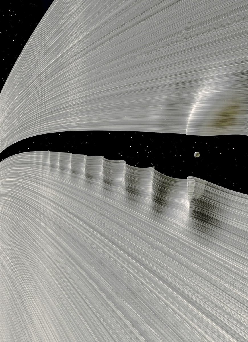 amazing_physics's tweet image. Breathtaking 😲😲😲Tiny Moon &apos;Daphnis&apos; creating giant waves in Saturn&apos;s Rings.🪐