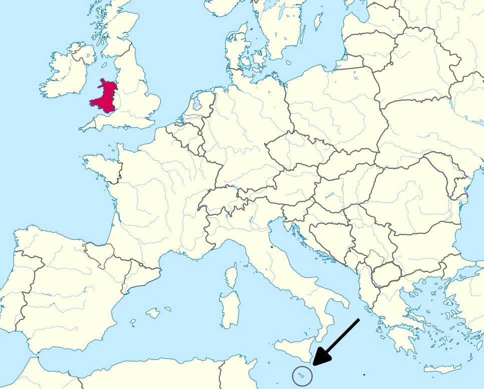 🏴󠁧󠁢󠁷󠁬󠁳󠁿  Cymru (top left) in red
🔎  Malta (bottom) within the magnifying glass.