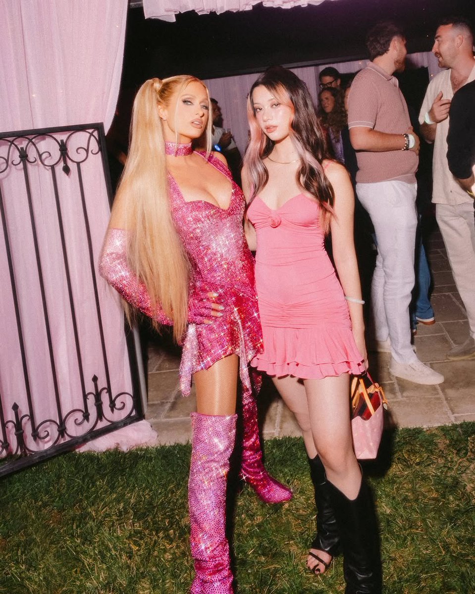 mejyok's tweet image. Feeling pretty in pink with the one and only Paris Hilton. A night to remember!