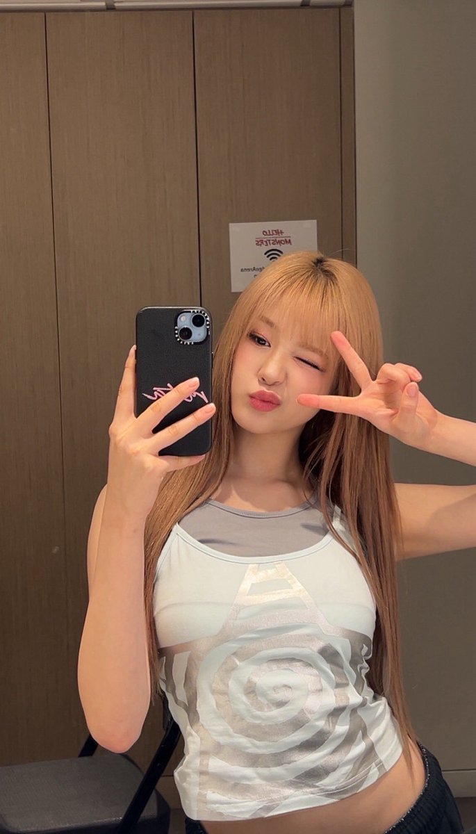 Just a wink and a peace sign, enough to keep you thinking about me all day.