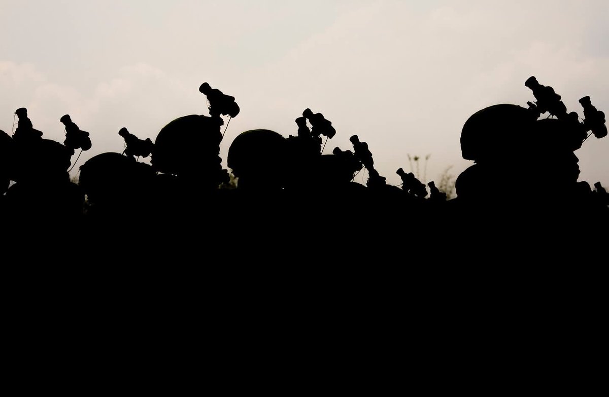 NoelKambanda's tweet photo. This photo of the RDF by @CyrilNdegeya, showing troops parading with night vision gear, is quite creative. https://t.co/fa0dcdRtPl