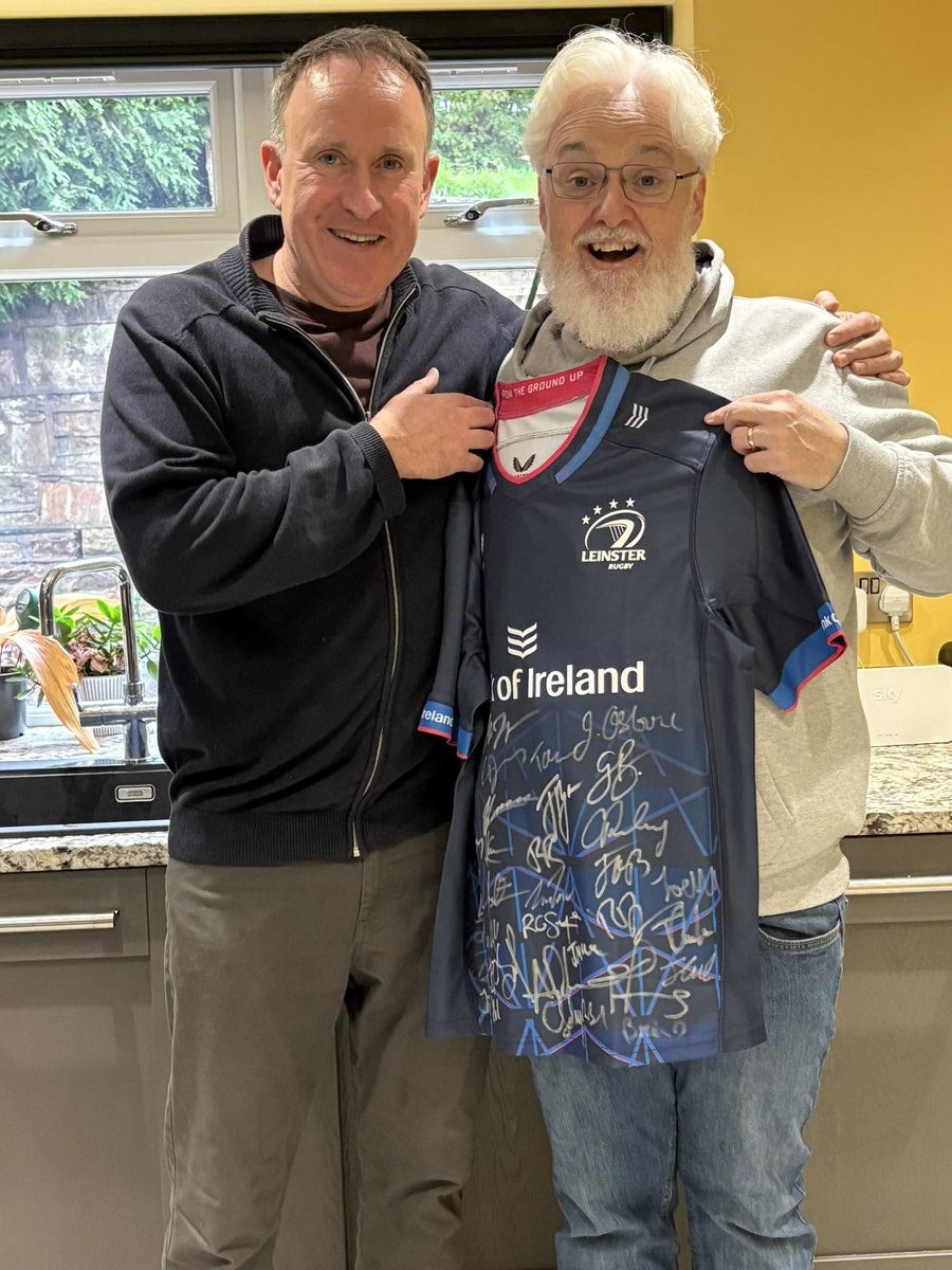 Caimh's tweet image. Brendan ‘the voice’ McDonald has made it through storm Amy to Manchester for the big Ring The Bells launch event tomorrow and he’s set an unassailable standard for 50th birthday pressies by getting me a Leinster jersey signed by the entire team.  
Genuinely over the moon.
