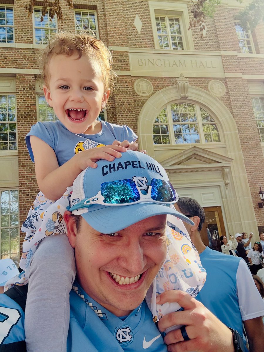 CarolinaCncrs's tweet photo. A little daddy daughter date in Chapel Hill to cheer on @uncfootball against Clemson! 

Proverbs 22:6 says, “Train up a child in the way he should go; even when he is old he will not depart from it.” 

Way to raise your future Tar Heel 🐏💠 right, Zach! 🩵🎀 https://t.co/XL14Gugze3