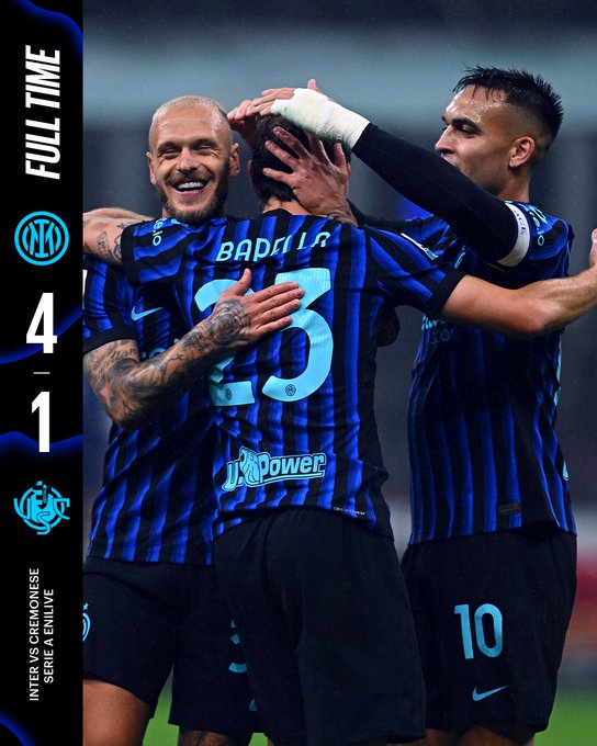 Three soccer players in Inter Milan jerseys celebrating on a field. One player, wearing a jersey with "Barella" and the number 23, is being hugged by two teammates. The jerseys are blue and black vertical stripes with a Nike logo and "InPower" text. The scoreboard shows a 4-1 victory, and text overlays indicate "FULL TIME" and "Inter vs Cremonese Serie A."