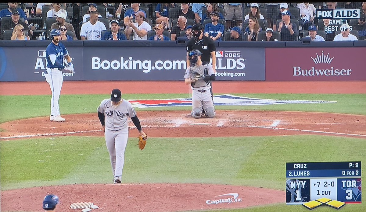 Muscle sitting in the stands behind the plate at the Toronto Yankees ALDS MLB game. 💪🏻 I bet he could hit a homer out of the park!