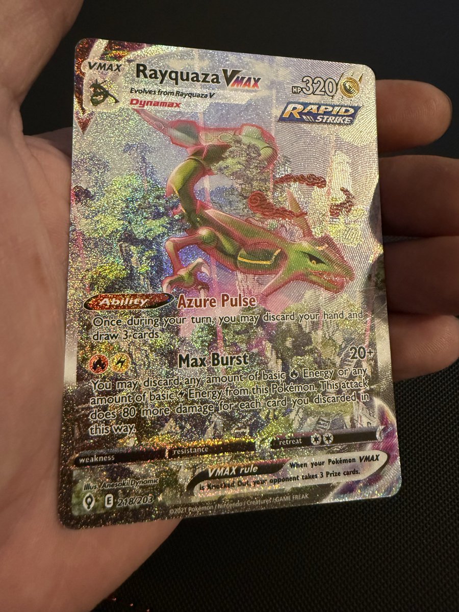 typeh20's tweet image. October 2022 was the month my son and I became serious Pokemon collectors. Rayquaza was pulled from a Rotom V tin sitting all by itself on a Target shelf. Espeon, from one pack my wife almost didn't buy for my son.
