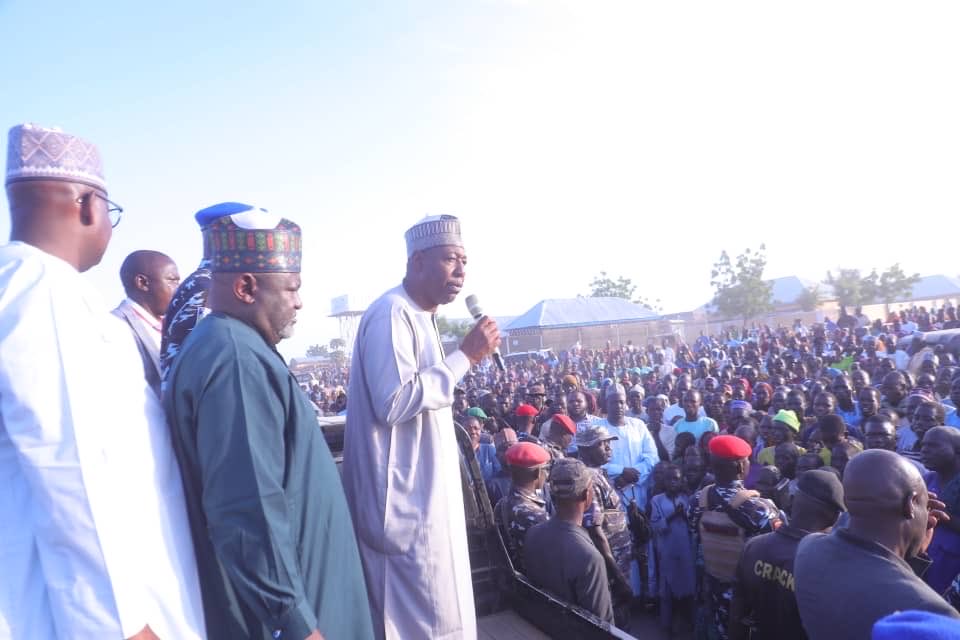 dauda_iliya's tweet photo. Banki: Zulum Strengthens Security of Borno Border Town, to Resettle 3 Additional Communities

@BornoGovt Borno State Governor, Professor Babagana Umara @ProfZulum Zulum, has assured residents of the border town of Banki that robust security measures will be implemented to protect the area from further attacks by Boko Haram insurgents.

Governor Zulum who is on a working visit to the town on Saturday was greeted by a large and enthusiastic crowd. 

He commended the people for their courage and resilience in the face of a recent attack, urging them not to be disheartened.

“I purposely came to Banki to salute your courage; your act of bravery is really encouraging,” Governor Zulum stated. “We should not allow a few bad elements to displace this town whose businesses and economic activities have been thriving.” 

He added, “I want to assure you that the insurgents will not succeed, Insha'Allah. We will strengthen the security of this border town and will support our youth volunteers, hunters, and vigilantes to further fortify this area.”

As part of his ongoing post-conflict recovery programme, the governor also announced the planned resettlement of three communities, Kumshe, Tarmu’a and Bula Yobe in Bama local government area.

“Kumshe, Tarmu’a and Bula Yobe will be resettled. The people deserve a dignified life and we are committed to delivering it,” he affirmed.

Governor Zulum also confirmed that the rehabilitation of Banki road has commenced, with 30 trucks already deployed to repair the dilapidated route.

He called on the people, particularly the youths, to actively participate in the ongoing voter registration exercise for the betterment of the society.

Similarly, Governor Babagana Zulum also addressed traders at the Banki Market where he urged them to be vigilant and cooperate with security agencies for sustainable peace in the area.