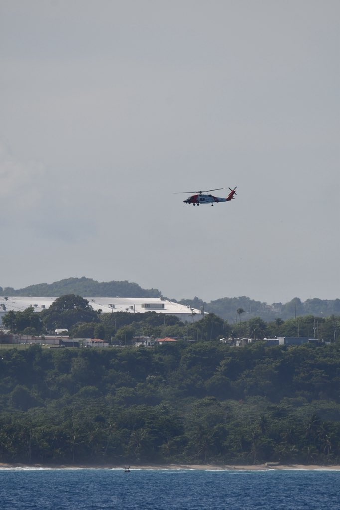 USCGSoutheast's tweet photo. #Breaking A @USCG AirSta Borinquen Jayhawk aircrew rescued 2 people, Sat., off Isabela, PR. Search is ongoing for 1 person. 

A life was needlessly lost bc aliens took to the sea w/o regard for the weather &amp; vessel sturdiness. CDR Romano #USCG 

Read: https://t.co/YIgp5YZeFX
#SAR https://t.co/G2JpUCyFmK