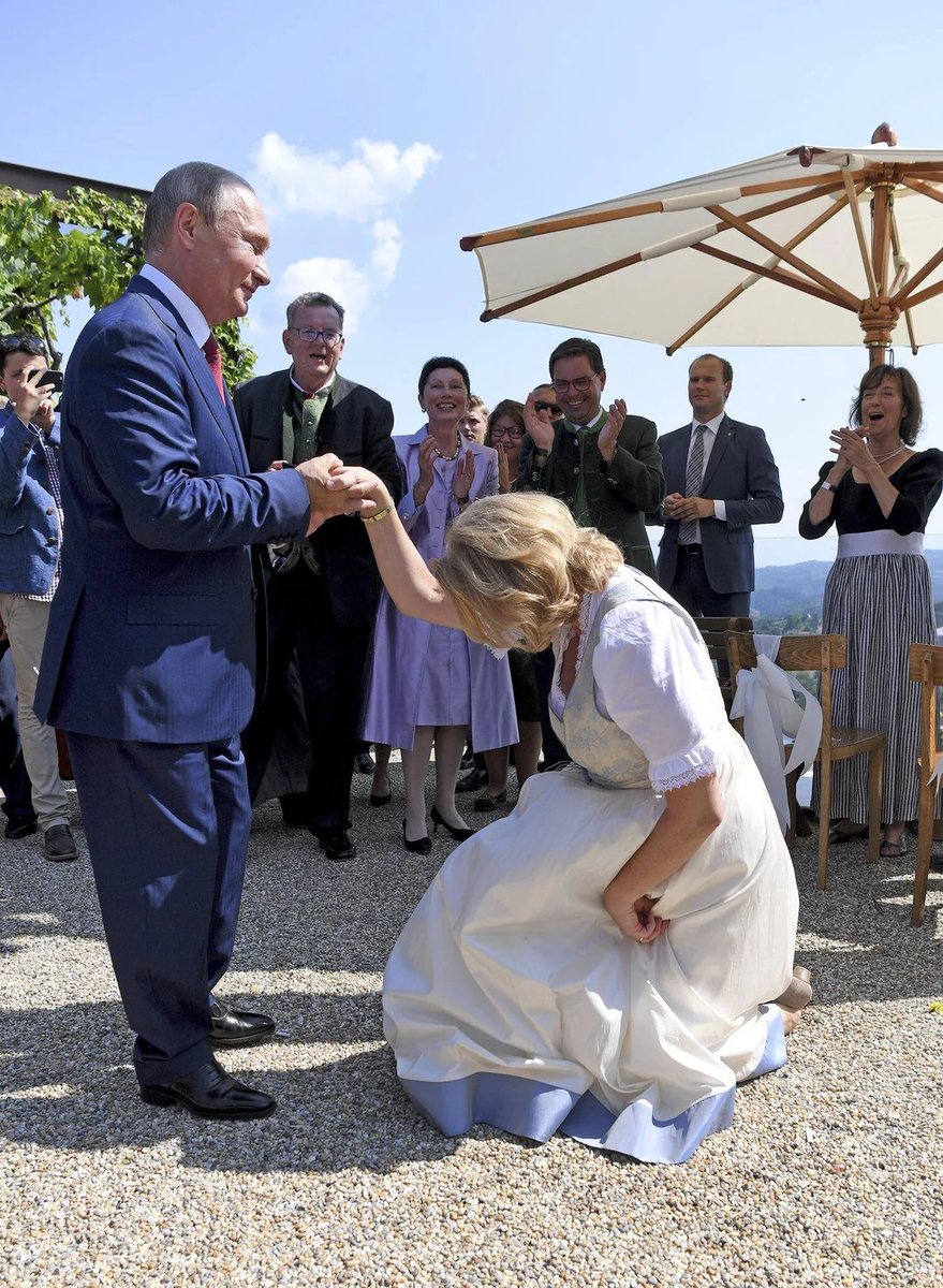 AUSTRIA

🚨Austria's former foreign minister doing a curtsy for Putin at her own wedding.

This is Karin Kneissl with Putin at her wedding in Styria in 2018. According to her, she randomly invited him at a state visit and He agreed to come. Austria had a right populist government