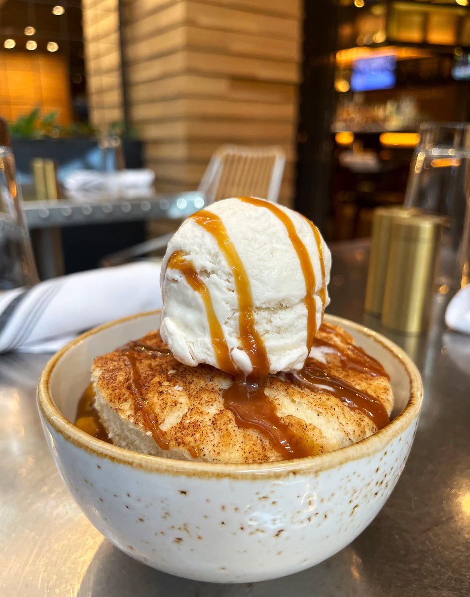 Now at Little Fib, our Warm Peach Cobbler! Warm, peachy perfection topped with cool vanilla bean gelato. 🍑✨ Our cobbler’s got that sweet Southern charm!  

Indulge yourself today. 

#RenHotels 
#NashvilleEats 
#RenNash
