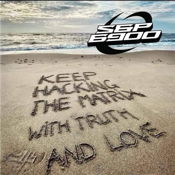 SPX6900 message on beach sand: Keep Hacking the Matrix with Truth and Love