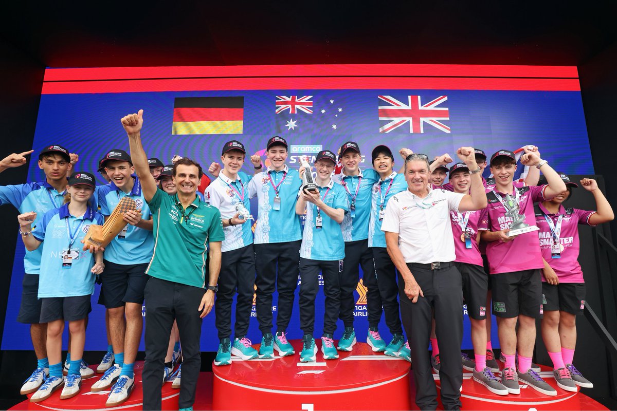 STEMRacingHQ's tweet photo. 🏁 The Singapore GP podium will shine tonight, but Thursday belonged to the STEM stars of the Aramco Racing World Finals 2025!

🥇 Lunar
🥈 Blue Wolves 
🥉 SBA Unity Racing

Trophies by Pedro De La Rosa &amp; Tatyana Dobson — and yes, Lunar did a shoey! 🇦🇺👟🏆 #F1 #STEM https://t.co/kNNgei6djI