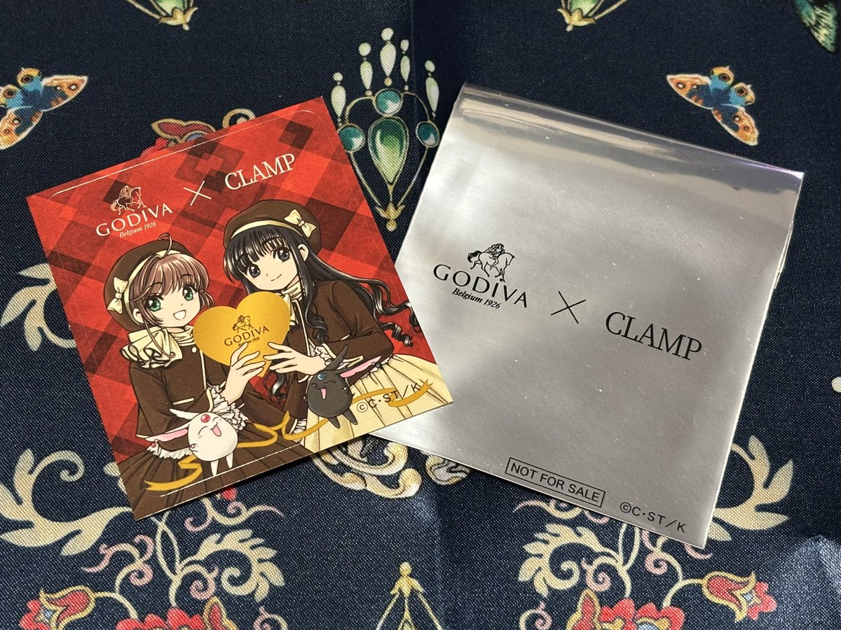 やっとGODIVA×CLAMPコラボのチョコ買いました！さくらと知世ちゃんのステッカーを自引き出来て嬉しい🥹タンブラーと保冷バッグ再入荷する頃にまた行きたいけど秒で枯れそう💦あと、ホリックのステッカーもほしい！