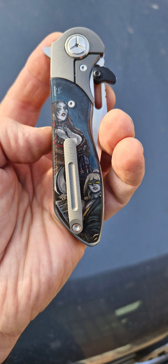 Artvisitor1's tweet photo. Decided to post another knife I ordered custom scales for. It's a Twosun TS229 and the images on the scales are by @anonarts_nsfw. Engraved pear tree scales, painted by hand and covered in epoxy. https://t.co/MMHPyr9rZq