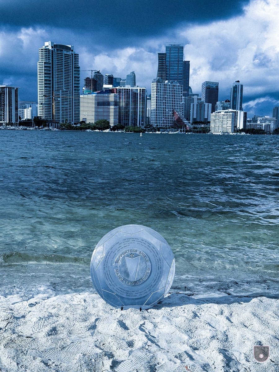 SiegeMiami's tweet photo. The Supporters Shield’s time in Miami has officially come to a close.

On behalf of the Miami Shield Committee, we want to say how much it meant to host the Shield here in South Florida. Over the past few weeks, we’ve had the honor of bringing it into the heart of our community; highlighting the people, places, and passion that make fútbol in Miami truly special.

We’re grateful for the trust placed in us and proud of the chapter we helped write.

Congratulations to the Philadelphia Union, the Sons of Ben, and the Doopin’ Delinquents on earning this year’s Shield. It’s a massive achievement; and we know you’ll carry it with the pride and care it deserves.

We’ll still be posting a few more moments from its time in the 305; memories we weren’t ready to leave behind just yet. Once those are shared, the Shield’s journey through Miami will live on in spirit; and in the hearts of those who got to experience it.

Thank you for letting us be part of its story. 🛡️💗🖤