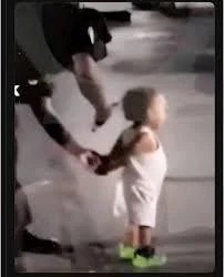 <a href="/MikeNellis/">Mike Nellis</a> A Toddler being detained and zip-tied as part of an early morning ICE raid in Chicago.