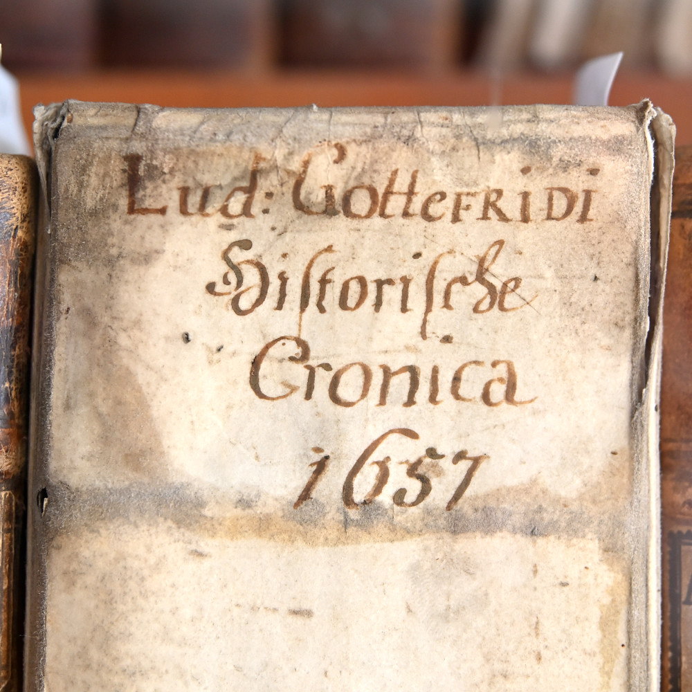 Spines.

Seen on a shelf locked behind glass. 
Lettered. Stamped. Gilded. 
Tantalising indications of what might lie within.
__ 

#books #design #history #publishing #typography #lettering #text