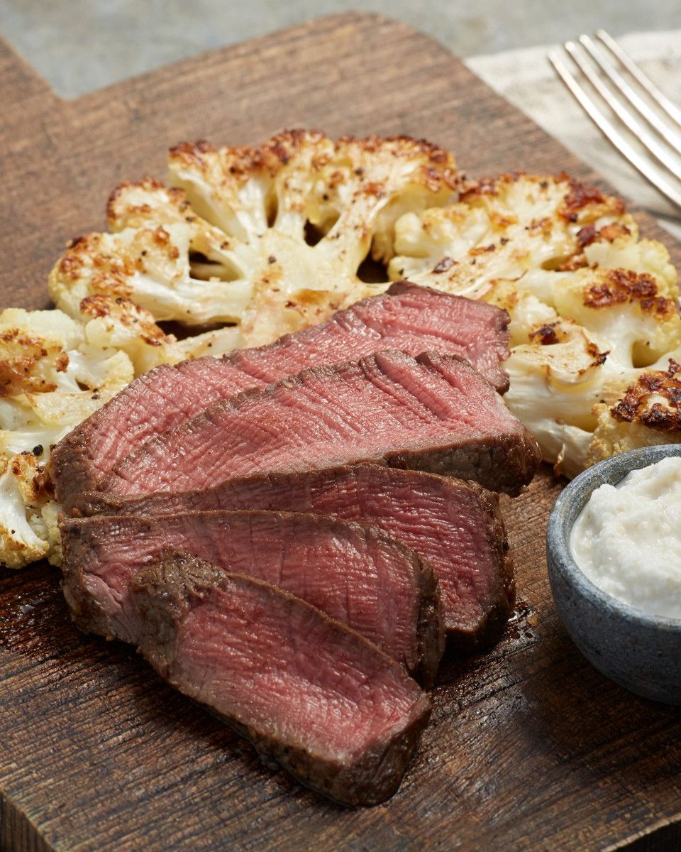 Beef's tweet photo. Two "steaks" in one recipe! But if you ask us, we'll take two tenderloins. 

Beef Tenderloin with Roasted Cauliflower "Steak" - https://t.co/pKy55M0YwB

#BeefFarmersAndRanchers https://t.co/qJWz4NvC2O