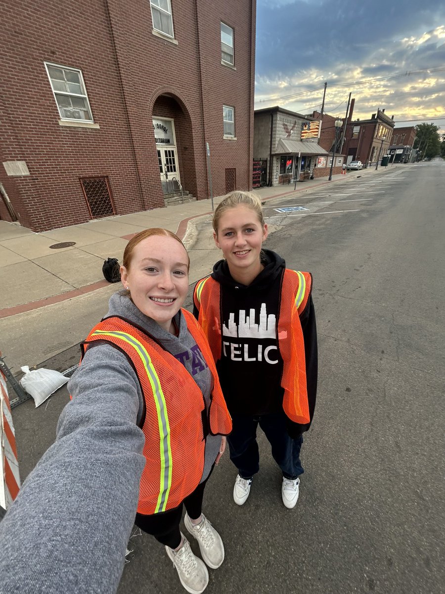 Pumpkin festival volunteers Ginger and Megan up early after a late night road trip! Hard core servant leadership 🧡🐅⚽️!