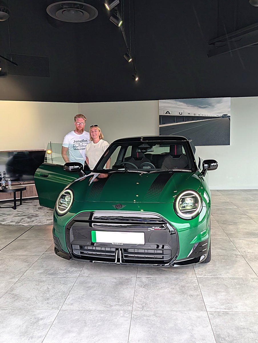 Mr &amp; Mrs B collecting their brand new MINI Cooper E Sport in British Racing Green and Level 2 pack, from Jordon Maxwell, MINI Champion at Marshall #MINI #Grimsby. 

Enjoy your MINI adventures! #marshallmoments