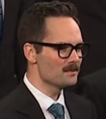 GrandpaJoeSux's tweet photo. Someone tell me who this guy is in the choir. I need his glasses. They match is mustache perfectly. #generalconference2025 https://t.co/VNYJzslmmG