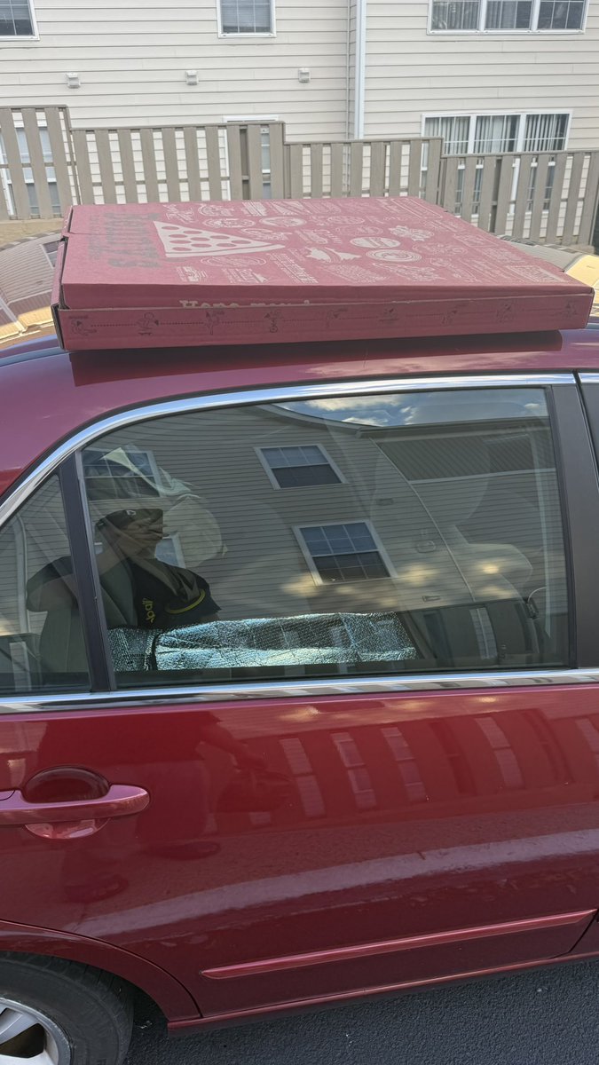 comically large pizza (2007 honda accord for scale)