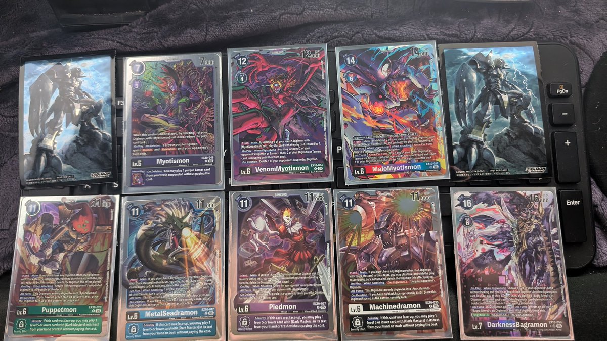 Reddest_Panda's tweet photo. Some of my favorite pulls so far from the @digimon_tcg_EN Sinister Order Booster box we started opening last night on stream. 12 packs down and we only had a couple duplicate rares or better which is awesome since 2 come in each pack.

Giveaway below if you want to win a box! 👇 https://t.co/6DhB2X3E64