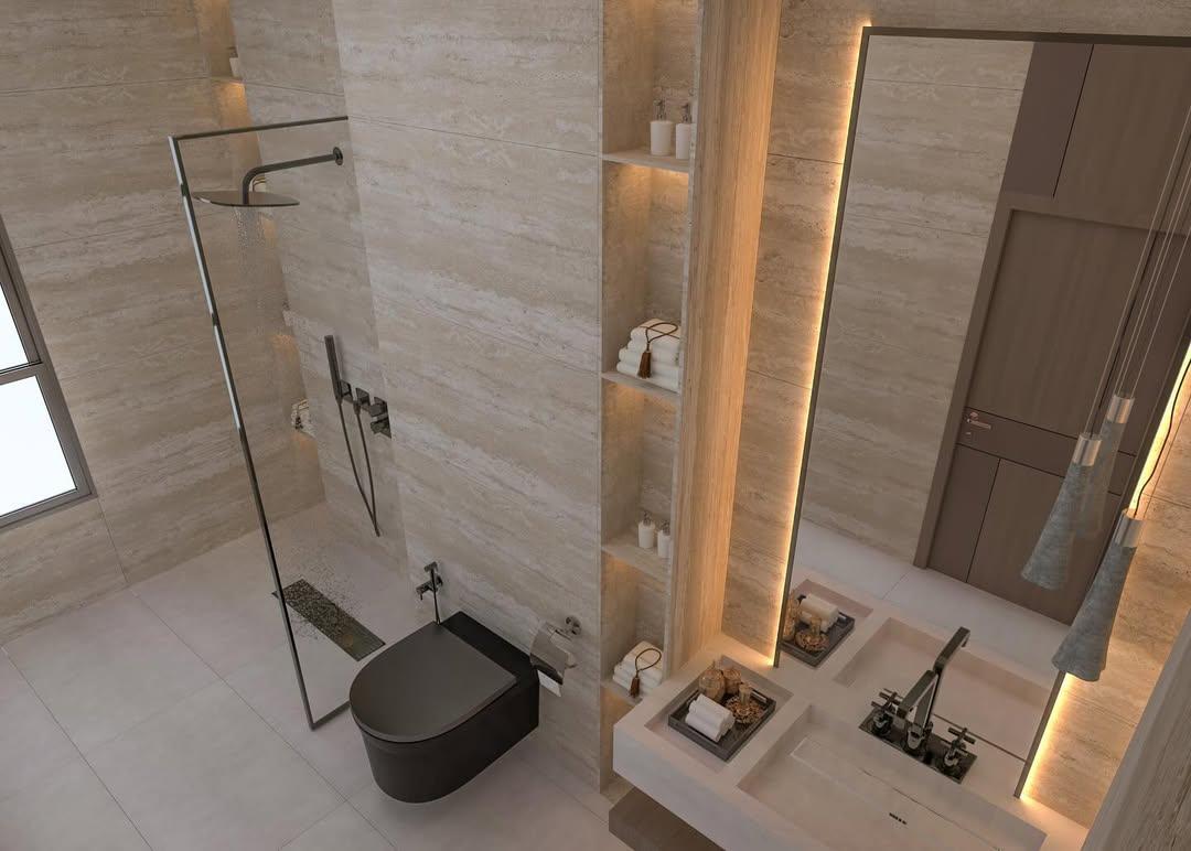 ✨ اكتشف روعة التصميم العصري في كل تفصيل ✨
حمّام أنيق يجمع بين الفخامة والبساطة بخطوط هندسية راقية وإضاءة دافئة تخلق أجواء استرخاء مثالية.

✨