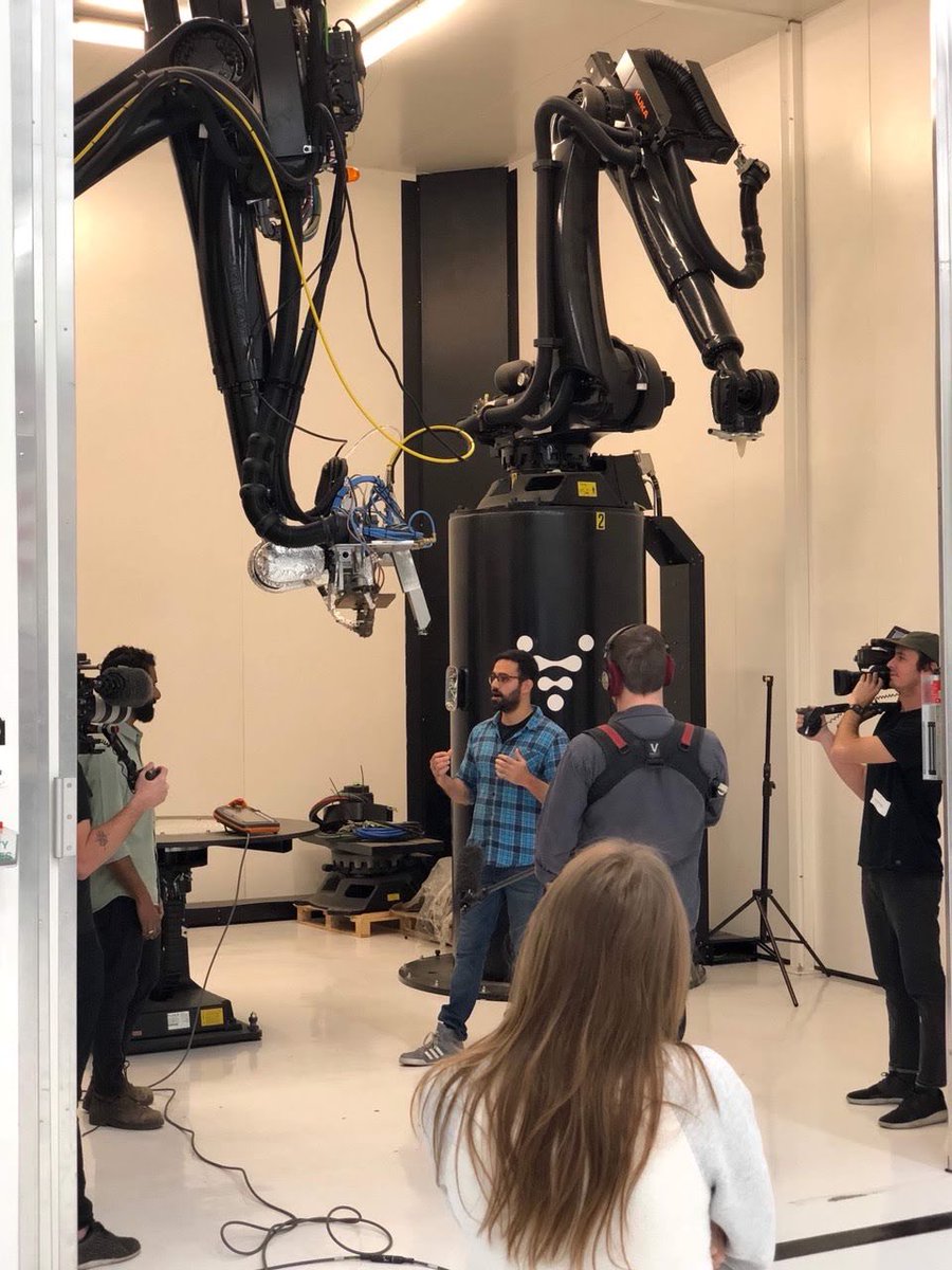 EdwardMehr's tweet photo. A friend sent a photo from 8 years ago; I was showing how robots could 3D print large metal structures.

Now they form, scan, and cut at @MachinaLabs_.

8 years from now, they’ll forge, heat-treat, weld, and assemble entire structures.

Going form design to complex metal structures with any army of Robocraftsman: high volume - high mix