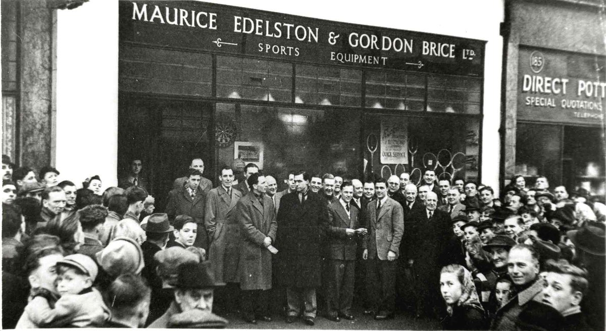 readinglibrary's tweet image. We&apos;re off to the Oxford Rd this week for the opening of the sports shop, Maurice Edelston &amp;amp; Gordon Brice Ltd., at no.183, c. 1951. Outside the shop are John Arlott, the B.B.C. cricket commentator, members of Reading FC, and the manager of the shop, Mr. Drake. #ReadingLocalHistory