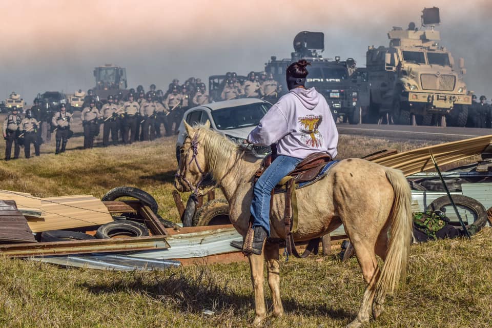 MargaretForSCC's tweet image. 350 years of American history in one photo.  This is Mega Mae Plenty Chief of the Lakota Nation, at Standing Rock during the #NoDAPL protests of 2016-2017.
