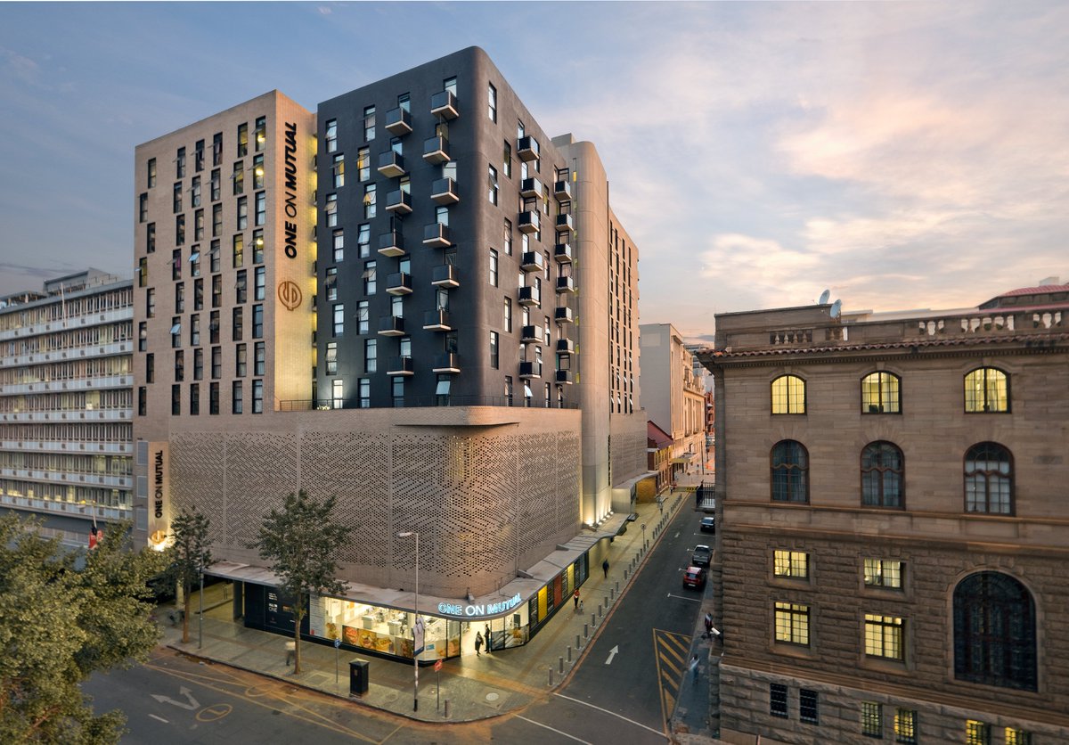 On #WorldArchitectureDay, we’re celebrating the fusion of heritage and modern design. One on Mutual in Pretoria blends red-brick charm with a sleek new build, a vibrant space to live, work &amp; shop. At Octodec, design means community. #OctodecProperties #UrbanDevelopment